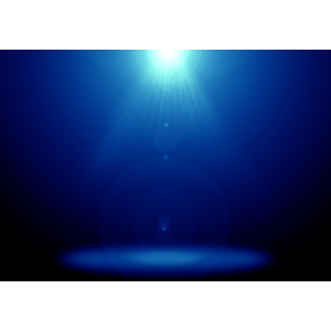 A picture of a stage with blue lights shining on it
