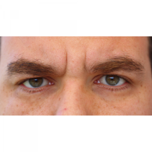 A mans bushy eyebrows