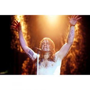 An old photo of Ozzy Osbourne on stage