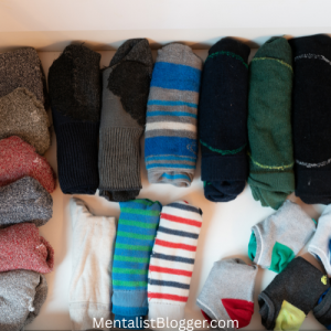 A picture of a drawer full of matching socks.