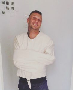 A picture of me in a straitjacket.