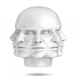 A statue of a head with multiple faces